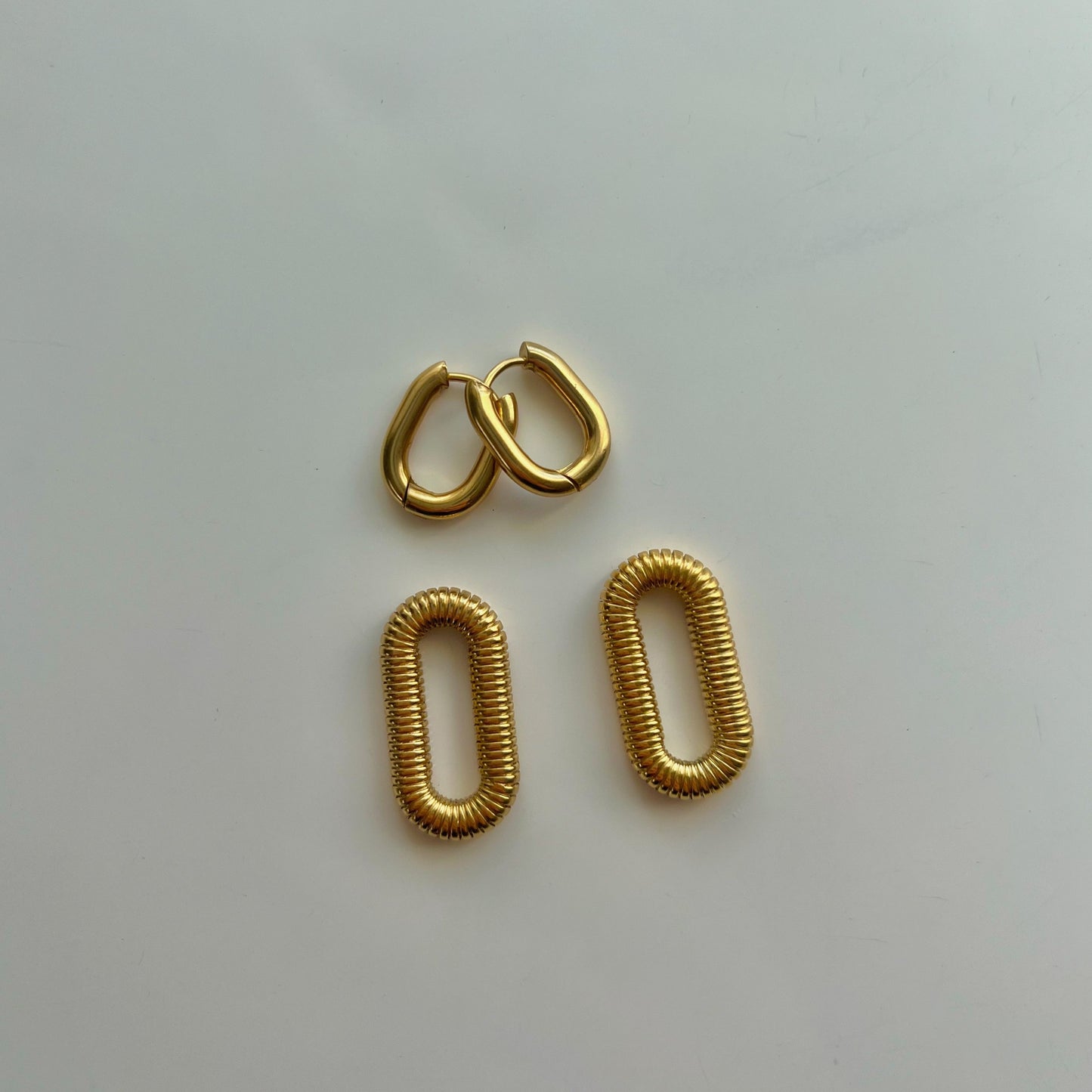 Versatile Elegance: 2 in 1 Chain Earrings by Baleh Jewels - Stainless Steel and Gold-Plated. Elevate your style with this customizable accessory suitable for all occasions. Durable stainless steel meets luxurious gold plating for a perfect blend of sophistication and adaptability.